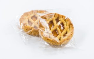 Packaged,Apricot,Jam,Tart,Cakes,On,A,White,Background